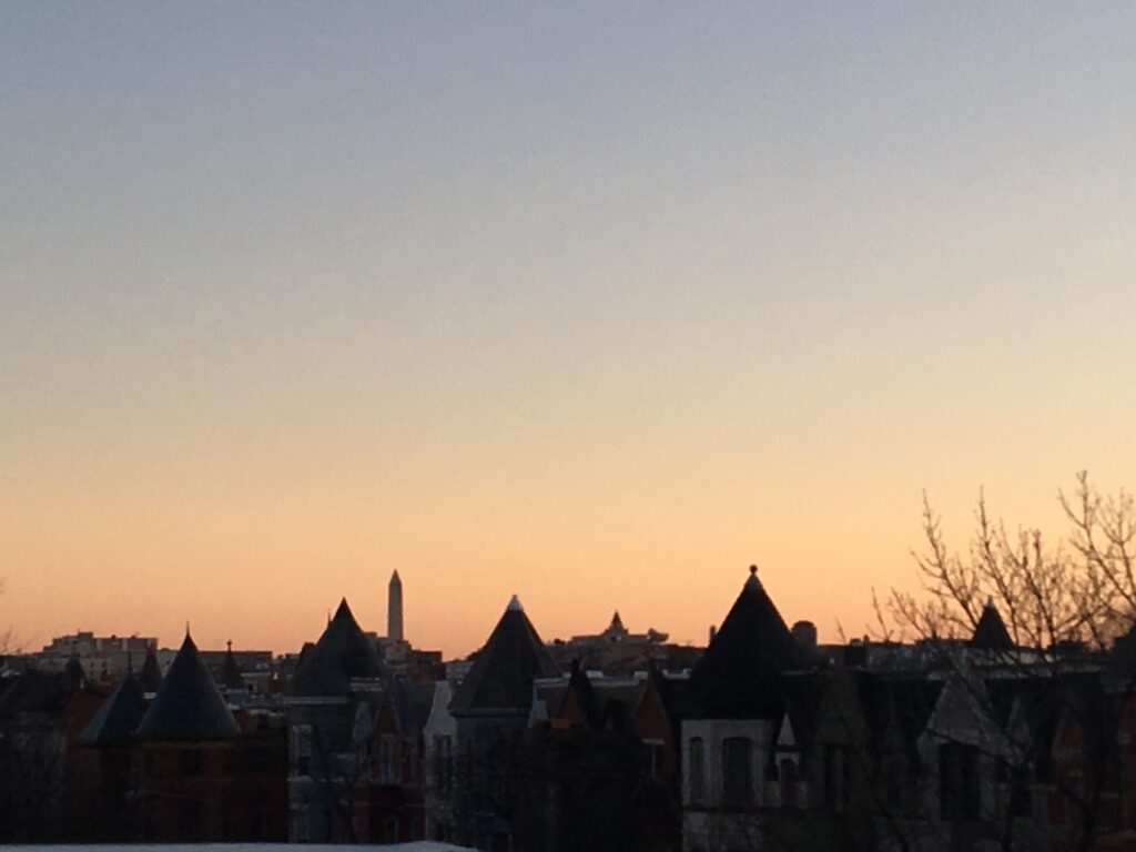 Sunset over rooftops.